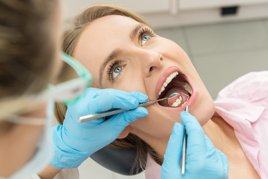 A dental examination reveals the need for a crown lengthening procedure.